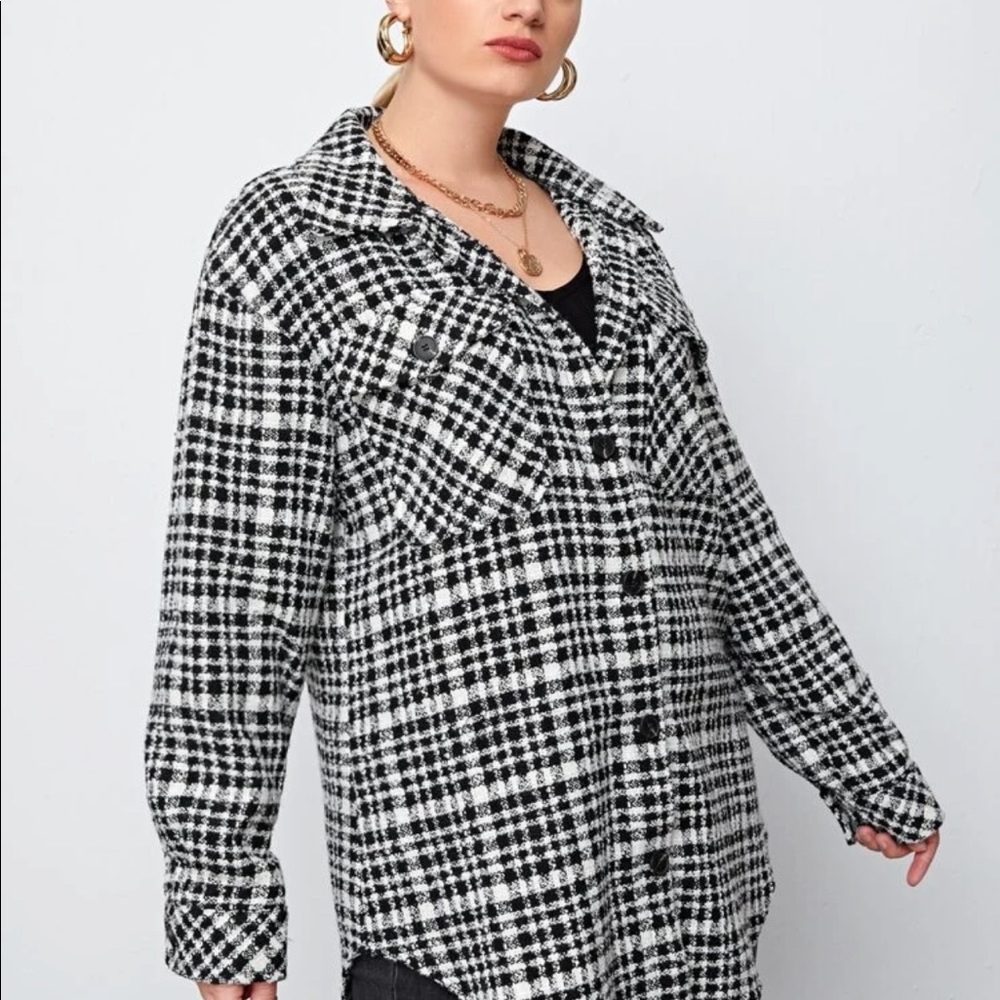 curved hem overcoat